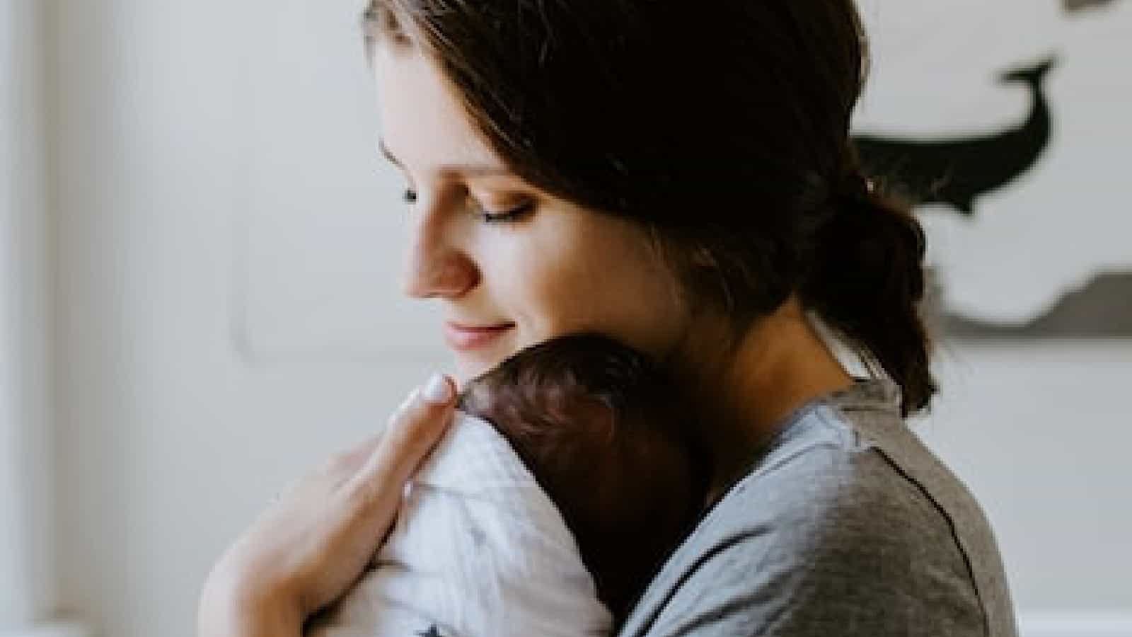 woman holding a baby